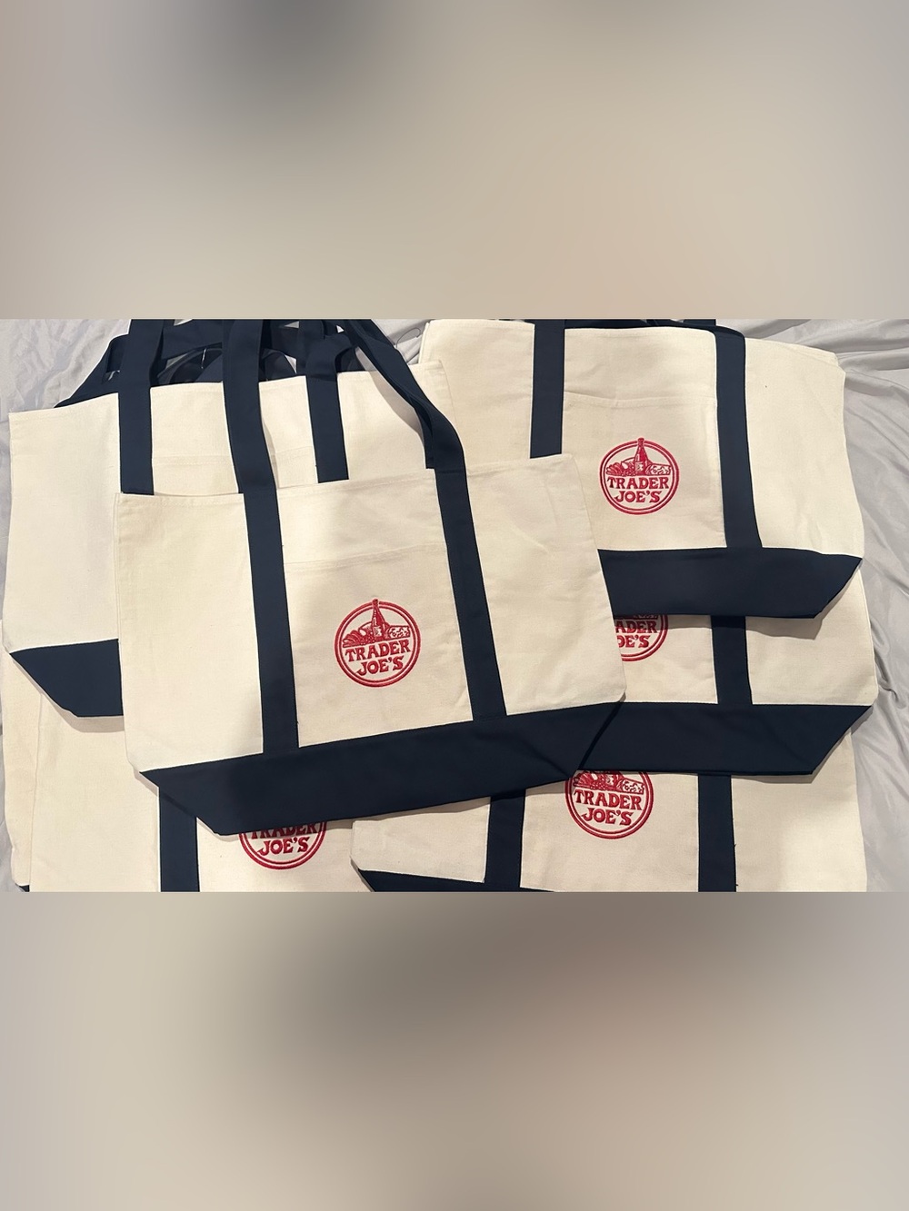 Trader Joe's Cream and Navy Canvas Tote Bag with Red Logo
